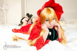 Rating: Safe Score: 0 Tags: 1girl blonde_hair blue_eyes blurry blurry_foreground chin_rest depth_of_field dress hand_on_own_cheek long_hair looking_at_viewer lying on_stomach photo red_dress shinku solo User: admin