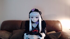 Rating: Safe Score: 0 Tags: 1girl black_dress couch dress flower frills hairband long_hair long_sleeves looking_at_viewer rose silver_hair sitting solo suigintou User: admin