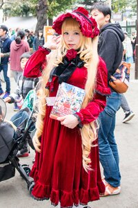 Rating: Safe Score: 0 Tags: black_hair blonde_hair dress flower hat long_hair multiple_boys multiple_girls rose shinku solo standing User: admin