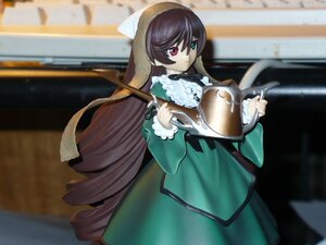 Rating: Safe Score: 0 Tags: 1girl auto_tagged blurry blurry_background brown_hair depth_of_field doll dress frills green_dress heterochromia instrument long_hair long_sleeves looking_at_viewer red_eyes solo suiseiseki very_long_hair User: admin