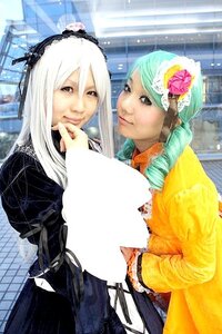 Rating: Safe Score: 0 Tags: 2girls dress fence flower hair_flower hair_ornament long_hair multiple_cosplay multiple_girls smile tagme white_hair User: admin