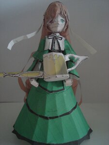 Rating: Safe Score: 0 Tags: 1girl bangs brown_hair doll dress green_dress grey_background holding knife long_hair long_sleeves puffy_sleeves simple_background solo suiseiseki User: admin