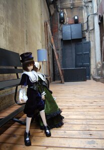 Rating: Safe Score: 0 Tags: 1girl brown_hair doll hat long_sleeves multiple_dolls outdoors shoes solo standing tagme white_legwear User: admin