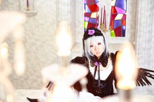 Rating: Safe Score: 0 Tags: 1girl 3d blurry blurry_background blurry_foreground depth_of_field dress looking_at_viewer motion_blur red_eyes short_hair silver_hair sitting solo stained_glass suigintou User: admin