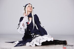 Rating: Safe Score: 0 Tags: 1girl auto_tagged boots dress frills full_body long_hair long_sleeves sitting solo suigintou watermark web_address white_hair User: admin
