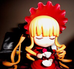 Rating: Safe Score: 0 Tags: 1girl blonde_hair bonnet bow chibi closed_eyes cup doll dress flower long_hair long_sleeves rose saucer shinku sitting sleeping solo tea teacup User: admin