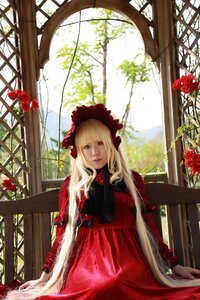 Rating: Safe Score: 0 Tags: 1girl blonde_hair blue_eyes bonnet dress flower long_hair looking_at_viewer red_dress red_flower red_rose rose shinku sitting solo window User: admin