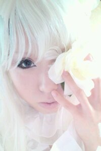 Rating: Safe Score: 0 Tags: 1girl bangs blonde_hair blue_eyes blurry close-up depth_of_field finger_to_mouth hands kirakishou lips solo User: admin