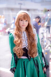 Rating: Safe Score: 0 Tags: 1girl blonde_hair blurry blurry_background blurry_foreground depth_of_field dress green_dress lips long_hair long_sleeves looking_at_viewer necklace photo skirt solo solo_focus standing suiseiseki User: admin
