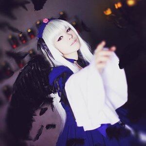 Rating: Safe Score: 0 Tags: 1girl blurry blurry_background depth_of_field flower hairband holding long_hair long_sleeves looking_at_viewer rose solo suigintou wings User: admin