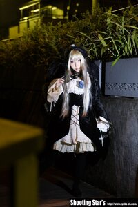Rating: Safe Score: 0 Tags: 1girl dress hat long_hair long_sleeves solo standing suigintou white_hair User: admin