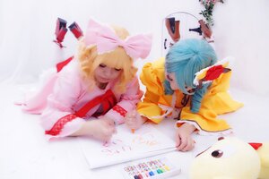 Rating: Safe Score: 0 Tags: 2girls blonde_hair blue_hair blurry blurry_foreground bow closed_eyes depth_of_field hair_over_eyes multiple_cosplay multiple_girls paper short_hair tagme User: admin