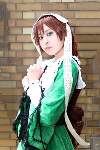 Rating: Safe Score: 0 Tags: 1girl against_wall brick_wall brown_hair dress green_dress green_eyes heterochromia lips long_hair long_sleeves looking_at_viewer red_eyes solo suiseiseki wall User: admin