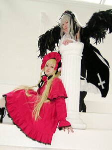 Rating: Safe Score: 0 Tags: 2girls black_wings blonde_hair bonnet closed_eyes cross dress frills image long_hair long_sleeves multiple_girls pair red_dress shinku silver_hair sitting suigintou wings User: admin
