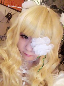 Rating: Safe Score: 0 Tags: 1girl bangs blonde_hair brown_eyes choker closed_mouth face flower hair_over_one_eye kirakishou lips long_hair looking_at_viewer photo portrait smile solo User: admin