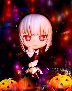 Rating: Safe Score: 0 Tags: 1girl bat candy chibi cross doll halloween jack-o'-lantern lantern pumpkin red_eyes smile solo suigintou white_hair User: admin