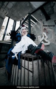 Rating: Safe Score: 0 Tags: 1girl blue_eyes hair_ornament sitting solo suigintou white_hair User: admin