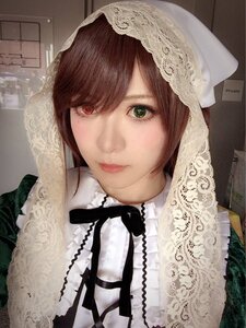 Rating: Safe Score: 0 Tags: 1girl bangs brown_hair closed_mouth green_eyes heterochromia lace lace_trim lips looking_at_viewer portrait smile solo suiseiseki User: admin