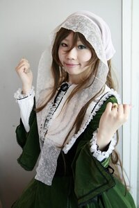 Rating: Safe Score: 0 Tags: 1girl brown_hair green_dress heterochromia jewelry long_hair long_sleeves looking_at_viewer nail_polish red_eyes ring smile solo suiseiseki User: admin