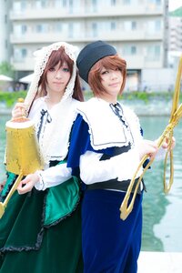 Rating: Safe Score: 0 Tags: 3d apron bangs blue_dress blue_eyes blurry blurry_background brown_hair building depth_of_field dress hat long_sleeves looking_at_viewer multiple_cosplay outdoors photo smile standing suiseiseki tagme User: admin