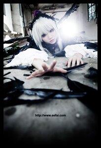 Rating: Safe Score: 0 Tags: 1girl 3d black_border blurry depth_of_field dress frills hairband letterboxed lips long_hair long_sleeves looking_at_viewer ribbon silver_hair solo suigintou wings User: admin