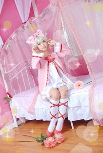 Rating: Safe Score: 0 Tags: 1girl blonde_hair blue_eyes curtains dress flower hinaichigo pink_ribbon ribbon rose see-through sitting solo sparkle User: admin