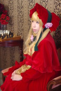 Rating: Safe Score: 0 Tags: 1girl blonde_hair blue_eyes bonnet bow capelet curtains dress flower lips long_hair pink_flower pink_rose red_capelet red_dress red_flower red_rose rose shinku sitting solo User: admin
