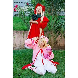 Rating: Safe Score: 0 Tags: 2girls blonde_hair bonnet dress flower food grass hat long_hair long_sleeves looking_at_another mary_janes multiple_cosplay multiple_girls nature outdoors plant ribbon shoes sitting standing tagme tree User: admin
