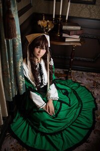 Rating: Safe Score: 0 Tags: 1girl brown_hair dress green_dress green_eyes long_sleeves looking_at_viewer nun own_hands_together sitting solo suiseiseki User: admin