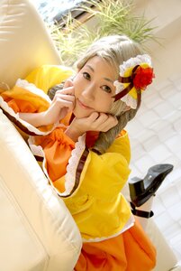 Rating: Safe Score: 0 Tags: 1girl braid chin_rest flower food green_eyes hair_flower hair_ornament kanaria lips looking_at_viewer lying on_stomach smile solo User: admin