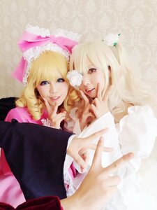 Rating: Safe Score: 0 Tags: 2girls blonde_hair blue_eyes dress flower hair_ornament lips long_hair multiple_cosplay multiple_girls realistic siblings sisters tagme twins User: admin
