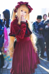 Rating: Safe Score: 0 Tags: 1girl blonde_hair blue_eyes blurry blurry_background blurry_foreground bow depth_of_field dress long_hair long_sleeves looking_at_viewer red_dress shinku solo solo_focus standing User: admin