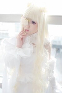 Rating: Safe Score: 0 Tags: 1girl bangs blonde_hair blurry closed_mouth depth_of_field dress indoors kirakishou lips long_hair long_sleeves looking_at_viewer solo striped upper_body window User: admin