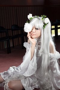 Rating: Safe Score: 0 Tags: 1girl bookshelf closed_mouth dress flower frills indoors kirakishou lips long_hair long_sleeves looking_at_viewer sitting solo white_dress white_hair User: admin