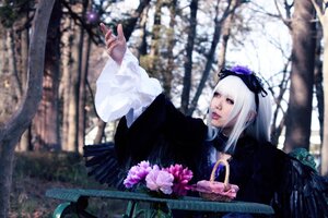 Rating: Safe Score: 0 Tags: 1girl bangs black_dress blurry blurry_background blurry_foreground depth_of_field dress flower lips long_hair long_sleeves motion_blur outstretched_arm red_eyes solo suigintou wings User: admin