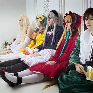 Rating: Safe Score: 0 Tags: 4girls blonde_hair bow brown_hair dress flower frills long_hair long_sleeves multiple_cosplay multiple_girls shinku silver_hair sitting suigintou tagme User: admin
