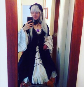 Rating: Safe Score: 0 Tags: 1girl blurry cellphone closed_eyes depth_of_field dress holding long_hair long_sleeves phone photo solo suigintou User: admin