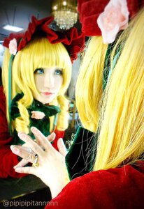 Rating: Safe Score: 0 Tags: 1boy 2girls bangs blonde_hair blue_eyes blurry dress flower hands hat holding_hands jewelry long_hair multiple_girls ring rose shinku solo User: admin