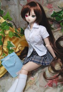 Rating: Safe Score: 0 Tags: 1girl brown_hair doll green_eyes heterochromia long_hair red_eyes shirt short_hair sitting skirt solo suiseiseki white_legwear User: admin