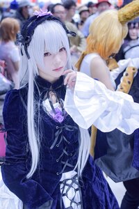 Rating: Safe Score: 0 Tags: blonde_hair blurry blurry_background blurry_foreground depth_of_field dress frills hairband long_hair looking_at_viewer multiple_girls photo red_eyes ribbon solo suigintou white_hair User: admin