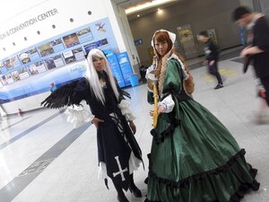 Rating: Safe Score: 0 Tags: bird brown_hair closed_eyes dress instrument long_hair multiple_cosplay multiple_girls music photo playing_instrument standing tagme User: admin