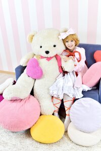 Rating: Safe Score: 0 Tags: 1girl blonde_hair blue_eyes bow dress frills hat heart hinaichigo pillow ribbon solo stuffed_animal teddy_bear User: admin