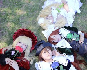 Rating: Safe Score: 0 Tags: 3girls blonde_hair blue_eyes brown_hair dress flower frills hat long_hair long_sleeves looking_at_viewer lying multiple_cosplay multiple_girls rose short_hair siblings smile tagme top_hat User: admin