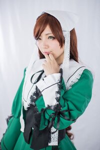Rating: Safe Score: 0 Tags: 1girl brown_hair dress finger_to_mouth green_dress green_eyes jewelry lips long_sleeves looking_at_viewer necklace realistic ribbon solo suiseiseki User: admin
