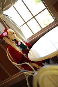 Rating: Safe Score: 0 Tags: 1girl blonde_hair blue_eyes blurry curtains depth_of_field dress flower indoors long_hair shinku sitting solo window User: admin