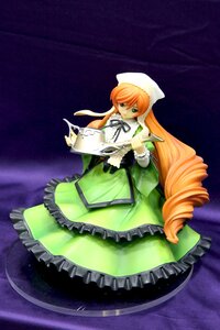 Rating: Safe Score: 0 Tags: 1girl doll dress drill_hair frills green_dress green_eyes hat long_hair long_sleeves orange_hair solo standing suiseiseki very_long_hair User: admin