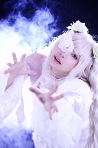 Rating: Safe Score: 0 Tags: 1girl blurry blurry_foreground depth_of_field flower green_eyes hands kirakishou lips long_hair looking_at_viewer parted_lips solo vertical_stripes white_flower white_hair User: admin