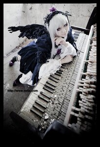 Rating: Safe Score: 0 Tags: 1girl auto_tagged black_wings dress feathers flower frills hairband instrument letterboxed long_hair silver_hair solo suigintou wings User: admin