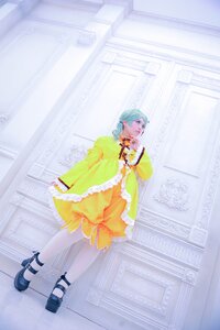 Rating: Safe Score: 0 Tags: 1girl aqua_hair building dress frills high_heels kanaria long_sleeves pantyhose shoes short_hair solo standing striped striped_legwear yellow_dress User: admin
