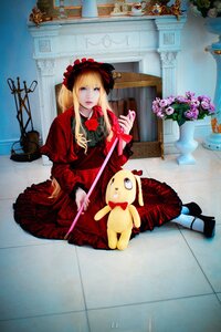 Rating: Safe Score: 0 Tags: 1girl blonde_hair blue_eyes doll dress flower lolita_fashion long_hair red_dress rose shinku sitting solo stuffed_animal User: admin